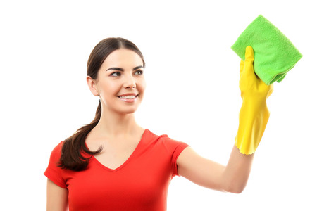 Young woman holding microfiber cloth, isolated on white