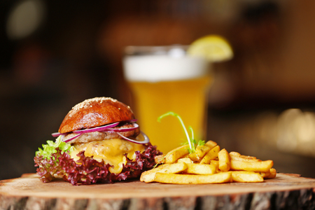 Fresh burger on a wooden board.の写真素材