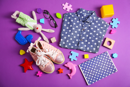 Kids setting on purple backgroundの写真素材