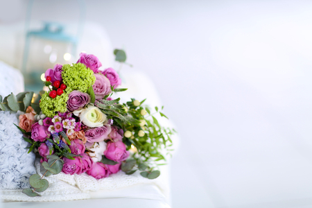 Bouquet of roses on a woolen blanket, closeupの写真素材