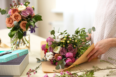Woman making a flower bouquetの写真素材