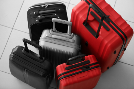 Suitcases on tile backgroundの写真素材