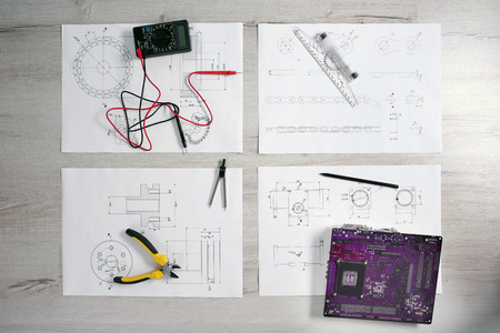 Project drawing and digital multimeter top viewの写真素材