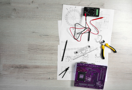 Project drawing and digital multimeter top viewの写真素材