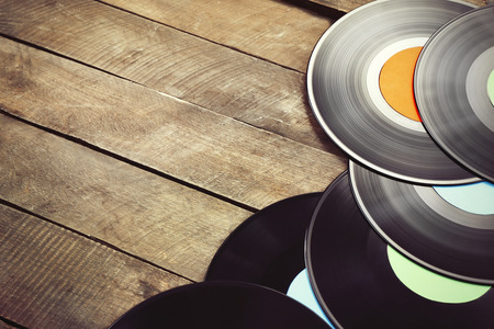 Vinyl records on wooden tableの写真素材