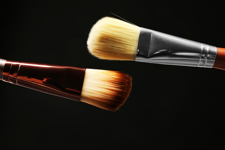 Professional makeup brushes on black backgroundの写真素材