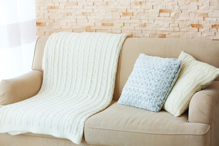 Stylish pillows on grey couchの写真素材