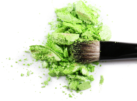 Makeup brush with cosmetic powder isolated on whiteの写真素材