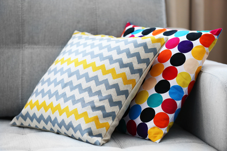 Stylish pillows on grey couchの写真素材