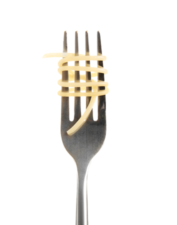 Spaghetti rolled on fork isolated on whiteの写真素材