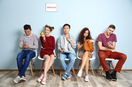 Group of people waiting for interview indoorsの写真素材