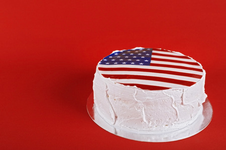 American flag cake, on red backgroundの写真素材