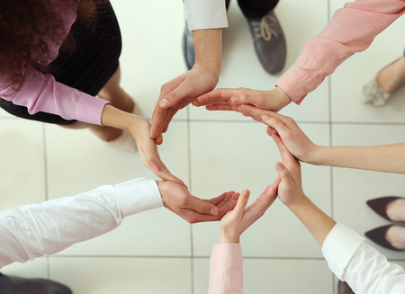 Teamwork concept. Business people handsの写真素材