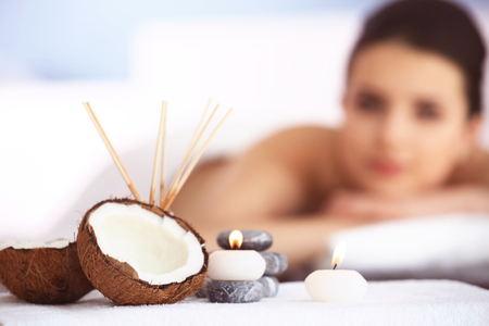 Spa set with coconut and aroma sticks, close upの写真素材