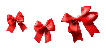 Red ribbon bows on a white backgroundの写真素材