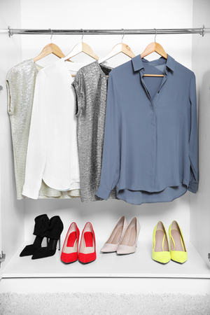 Female clothes hanging in wardrobeの写真素材