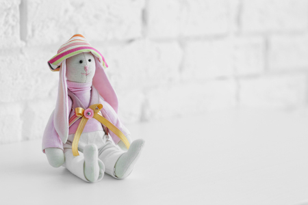 Baby toy on brick wall backgroundの写真素材