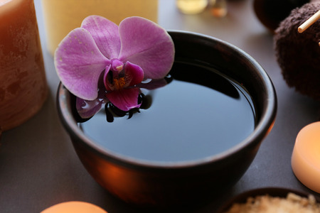 Beautiful composition of spa treatment on grey backgroundの写真素材