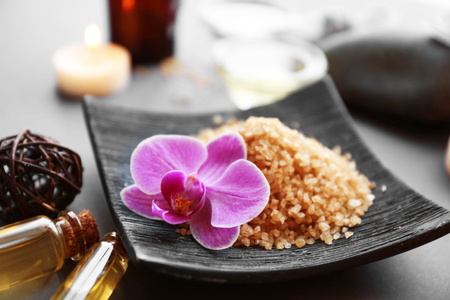 Beautiful composition of spa treatment on grey backgroundの写真素材