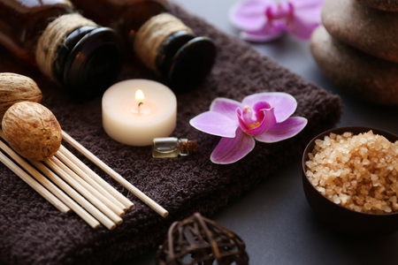 Beautiful composition of spa treatment on grey backgroundの写真素材
