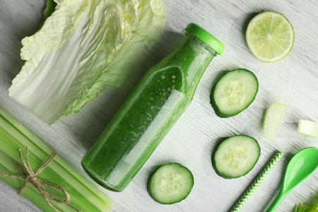 Fresh healthy smoothie on wooden backgroundの写真素材