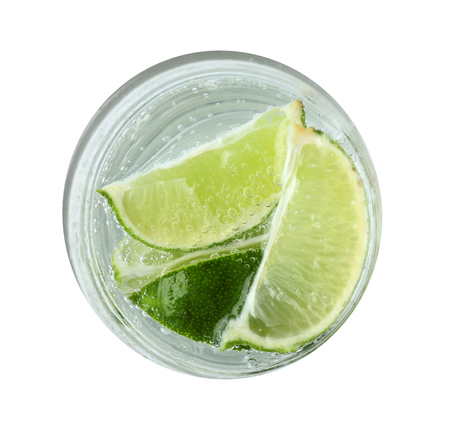 Fresh cocktail with soda, lime on white backgroundの写真素材