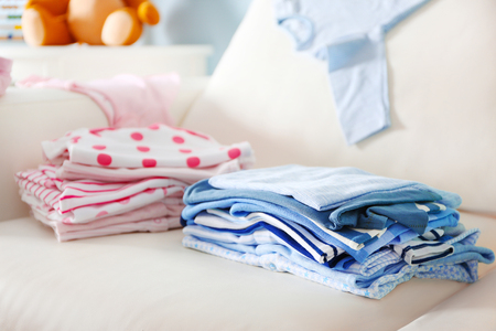Pile of baby clothes, close upの写真素材