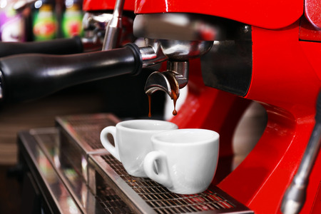 Coffee machine with cups, close-upの写真素材