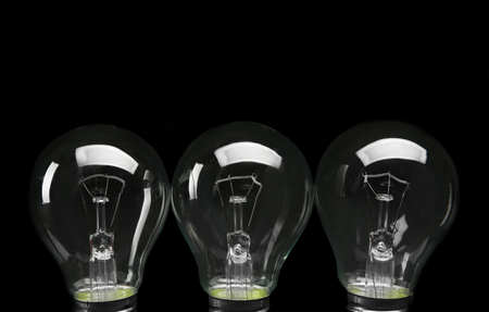 Electric bulbs on dark grey backgroundの写真素材