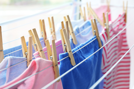 Drying baby clothes, close upの写真素材