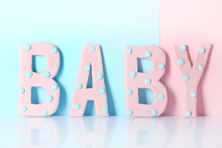 Word "Baby" on color backgroundの写真素材