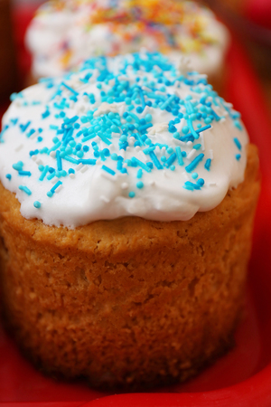 Easter cakes on the red trayの写真素材