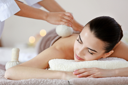 Young woman having spa procedures at the beauty salonの写真素材