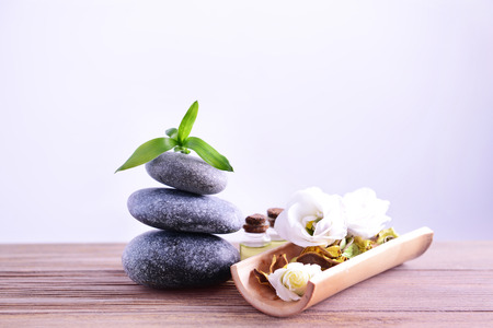 Spa composition with gray stones on light backgroundの写真素材