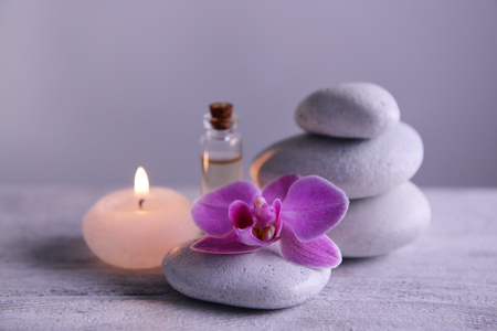 Spa composition with candle on gray backgroundの写真素材