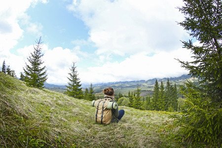 Female tourist in mountainsの写真素材