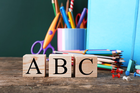 Colourful stationery and word ABC on the tableの写真素材