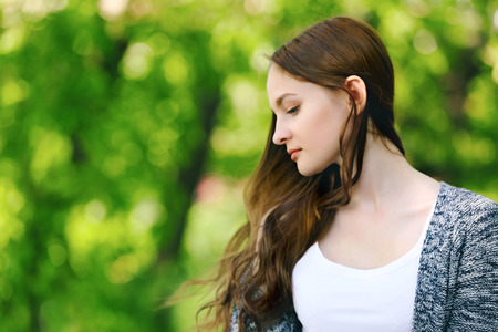 Portrait of beautiful girl in park