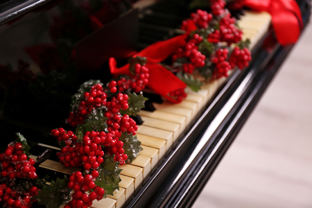 Christmas decoration on piano keys, closeupの写真素材
