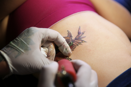 Process of making tattoo, closeupの写真素材