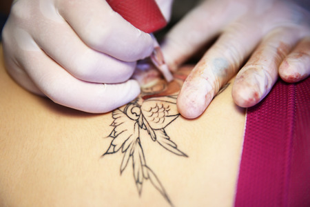 Process of making tattoo, closeupの写真素材