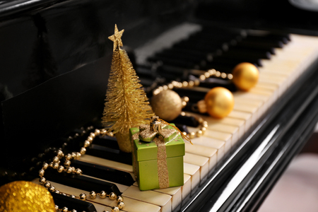 Christmas decoration on piano keys, closeupの写真素材