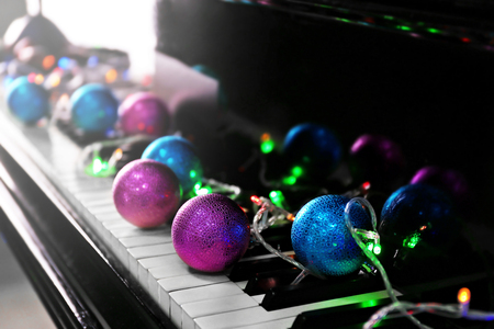 Christmas decoration on piano keys, closeupの写真素材