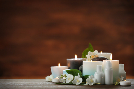 Spa composition with candles on brown backgroundの写真素材