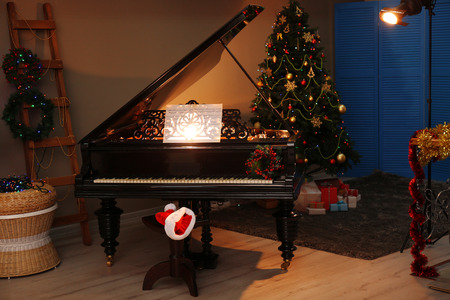 Piano with Christmas decorationsの写真素材