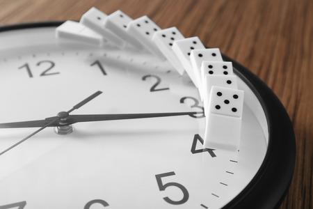 Dominoes on clock, closeup