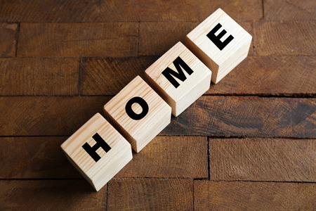 Word HOME on wooden backgroundの写真素材