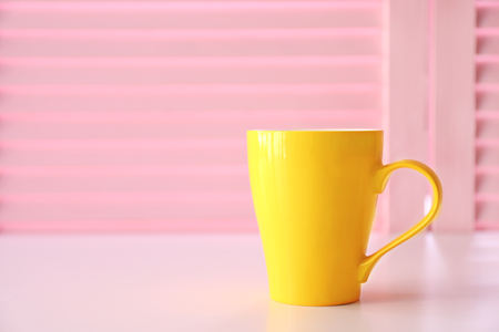 Cup on pink folding screen backgroundの写真素材