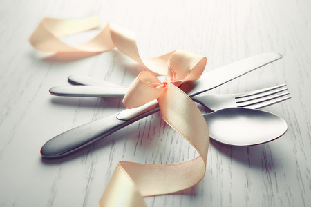 Beautiful table setting on white wooden tableの写真素材