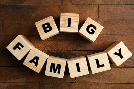 Words BIG FAMILY on wooden backgroundの写真素材
